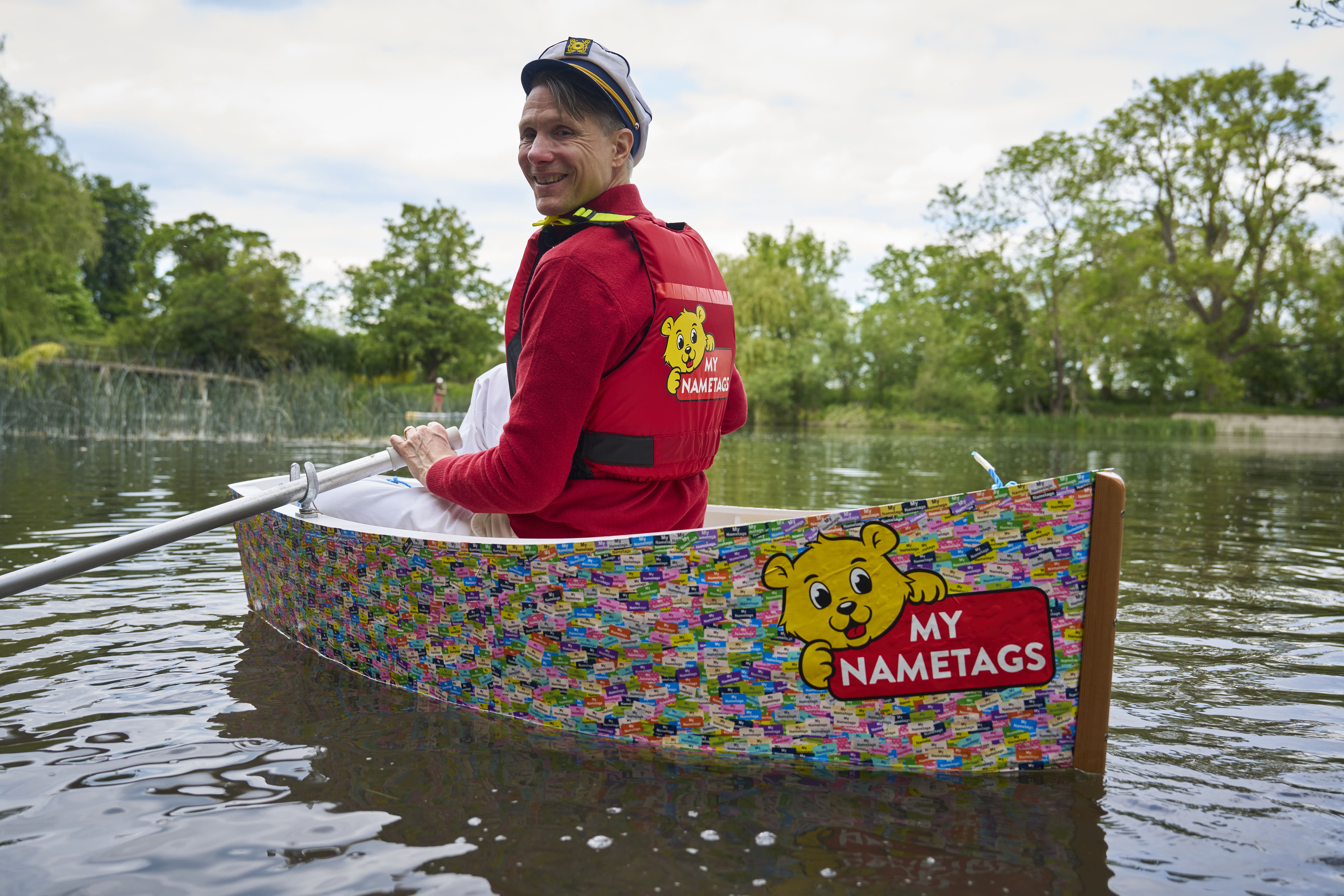 A rowing boat covered entirely in My Nametags waterproof name labels on the River Thames