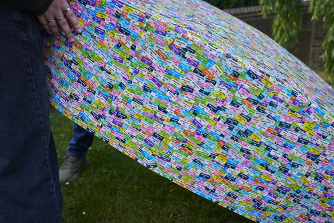 A boat hull covered in overlapping waterproof name labels